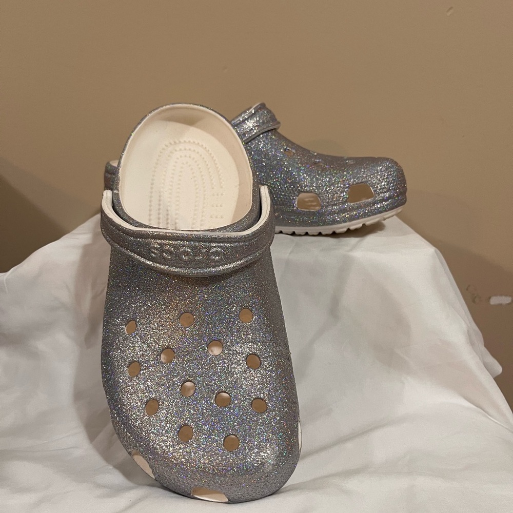 Crocs women’s size 11, men’s size 9